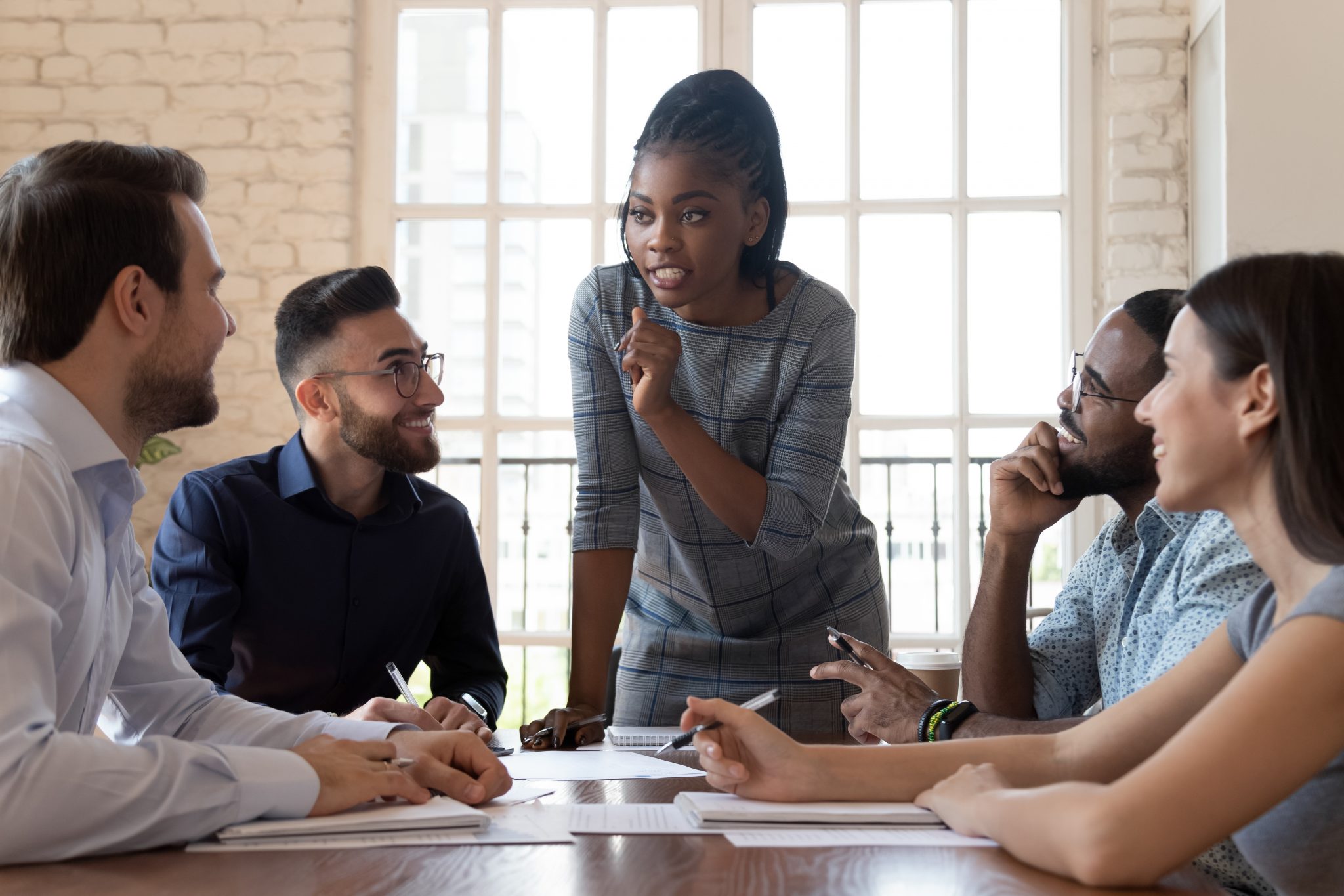 Black_Woman_Leading_Meeting-2048x1365